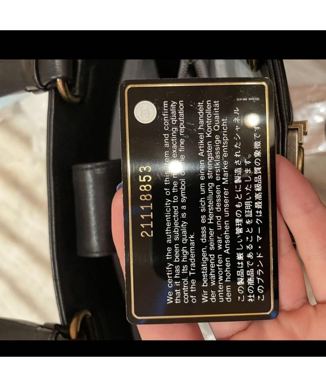 CHANEL Черная кожаная сумка с короткими ручками, фото 6