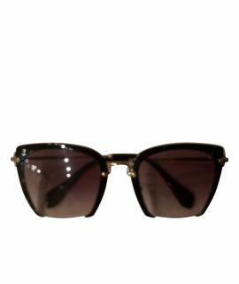 

Солнцезащитные очки MIU MIU